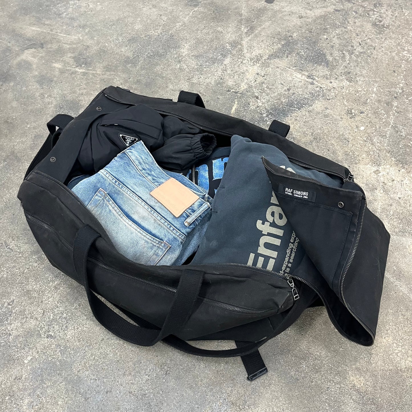 RAF Simon’s SS/03 Consumed Duffle Bag